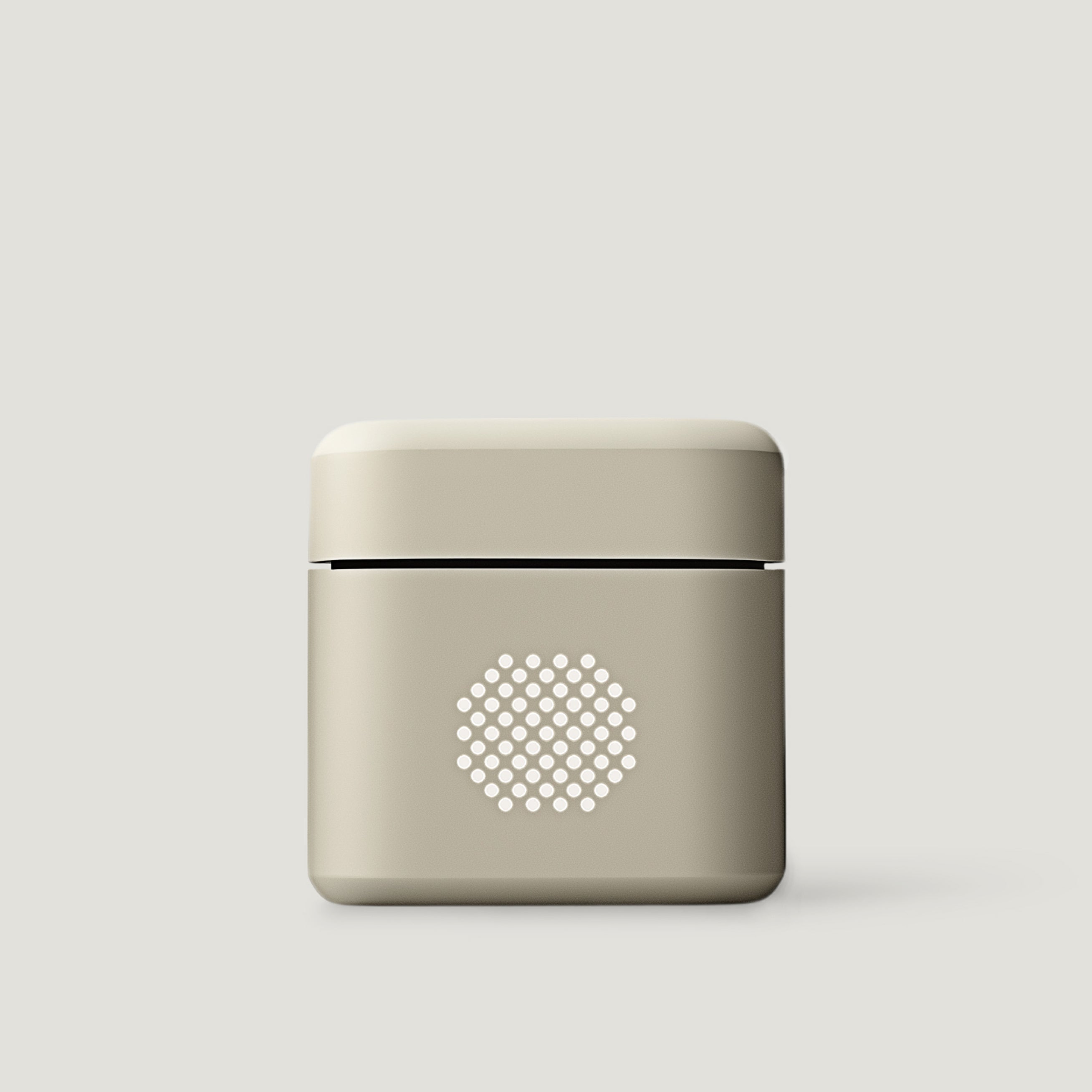 Cream compact audio amplifier on a neutral background