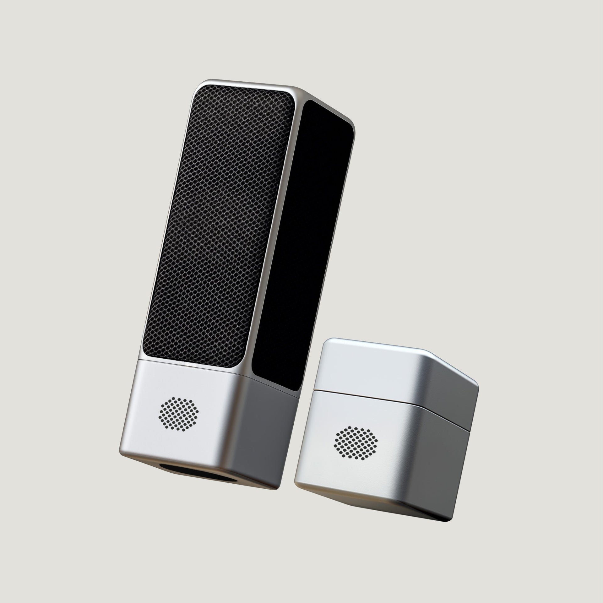 Silver SOVA R1 microphone and amplifier angled together