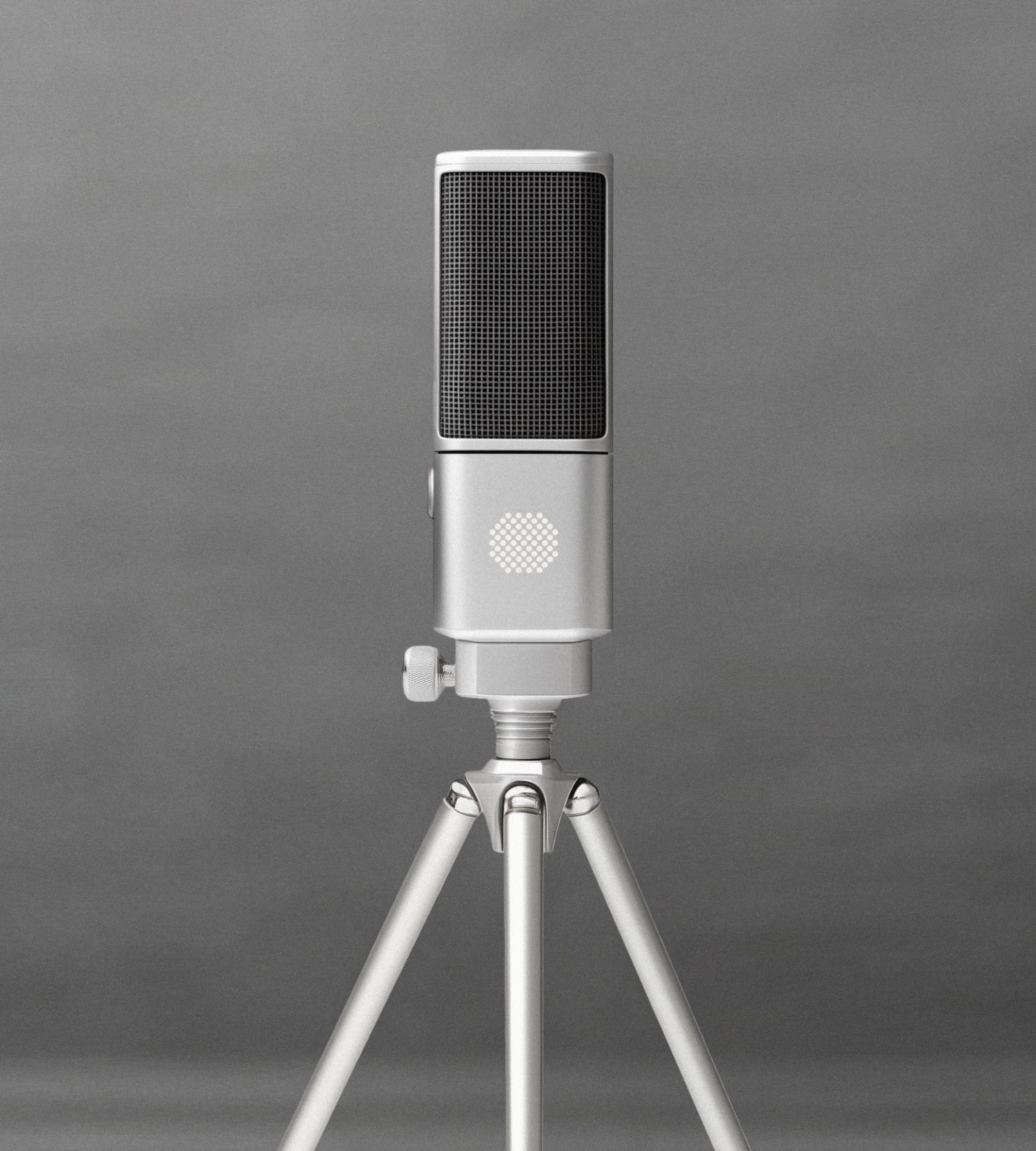 Microfone SOVA R1 prata em um tripé sobre fundo cinza