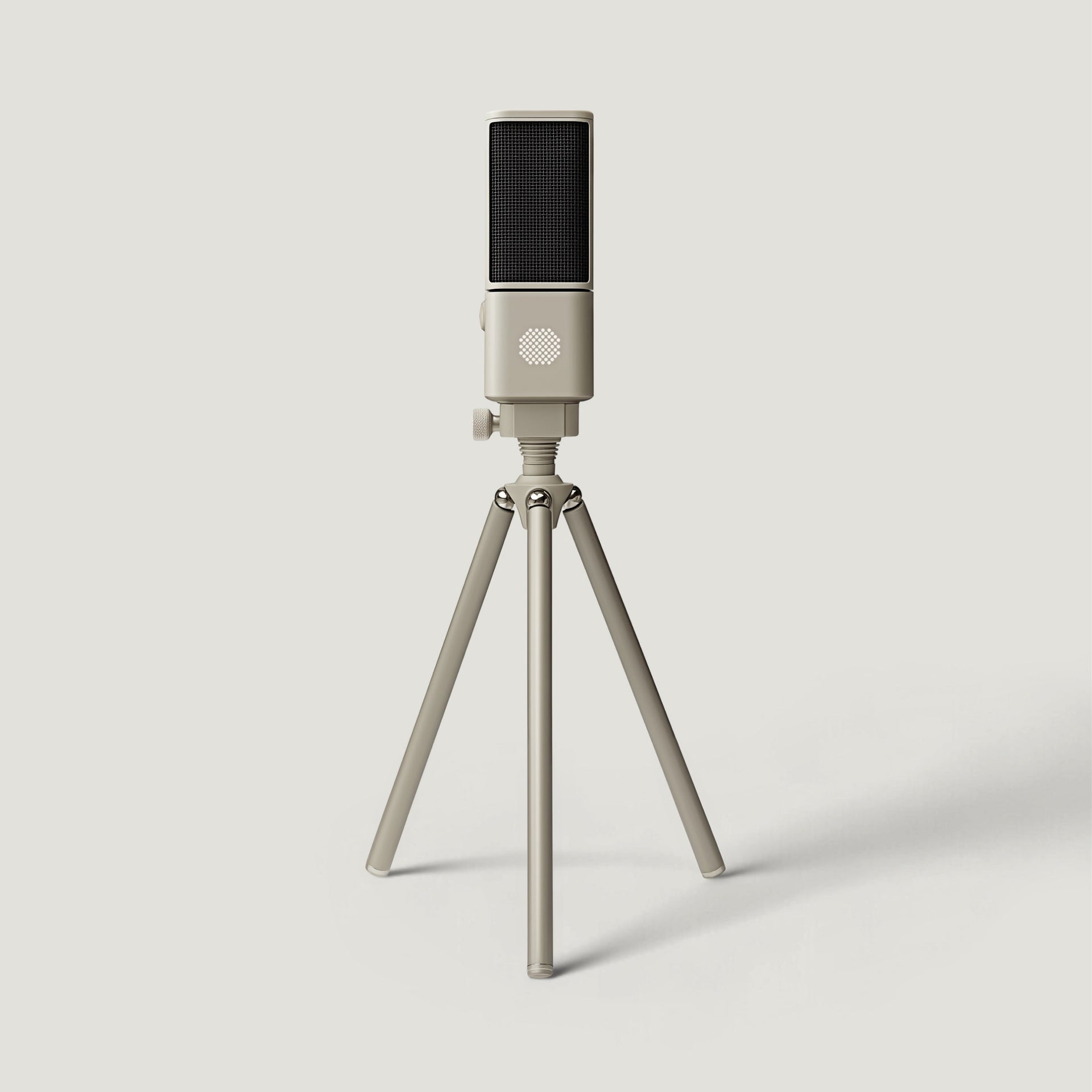 Cream SOVA R1 microphone on a short tabletop tripod