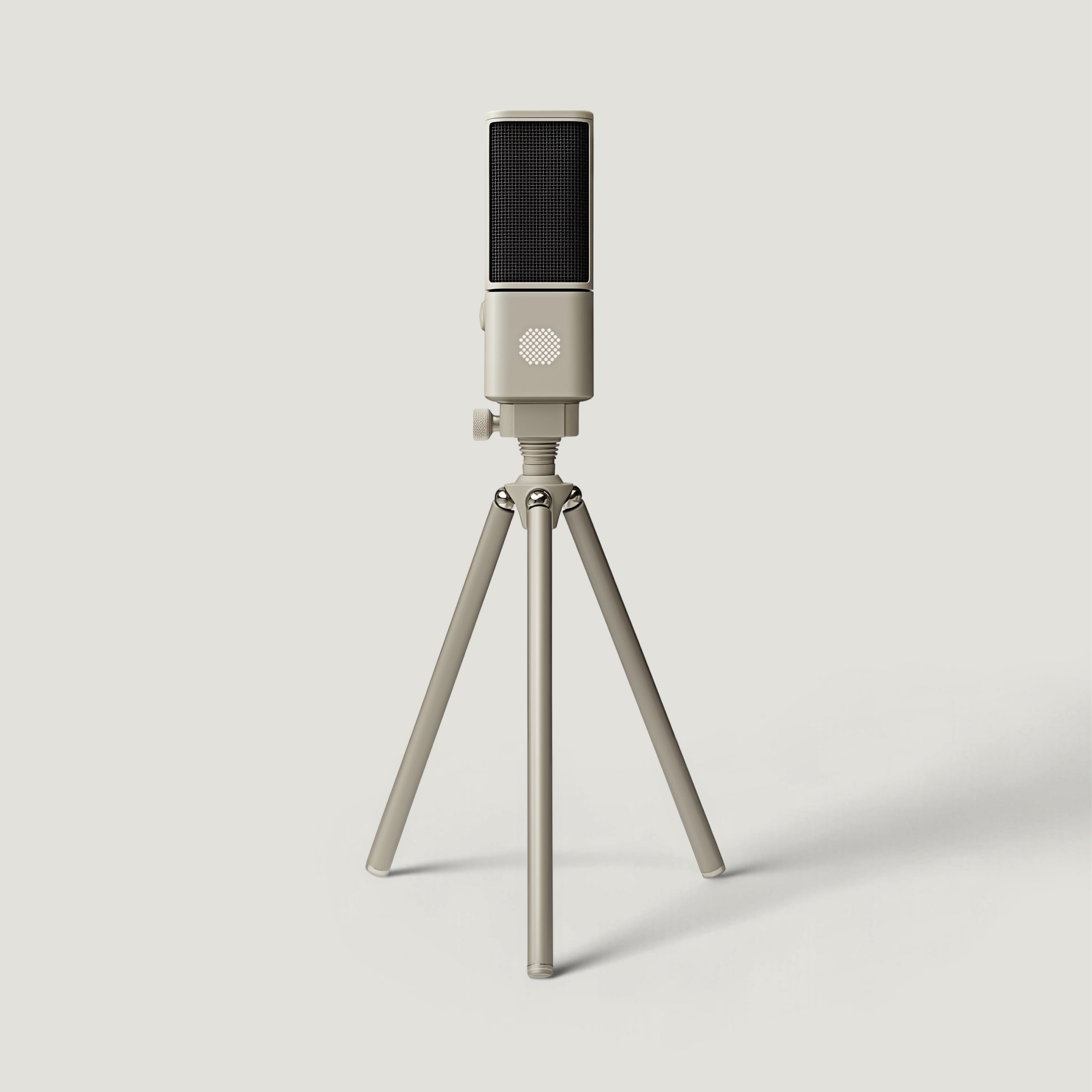 Cream SOVA R1 microphone on a short tabletop tripod