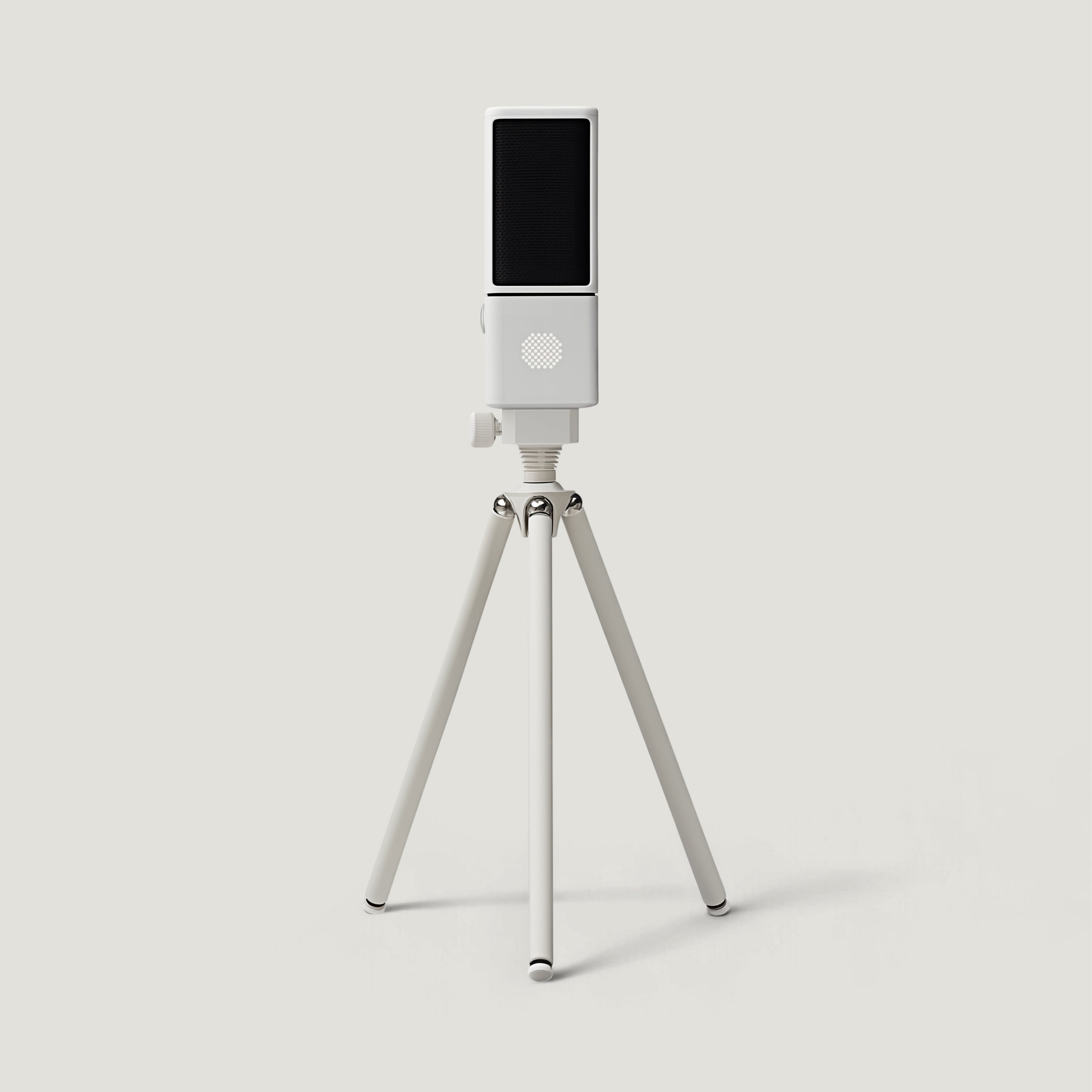 Silver SOVA R1 microphone on a short tripod