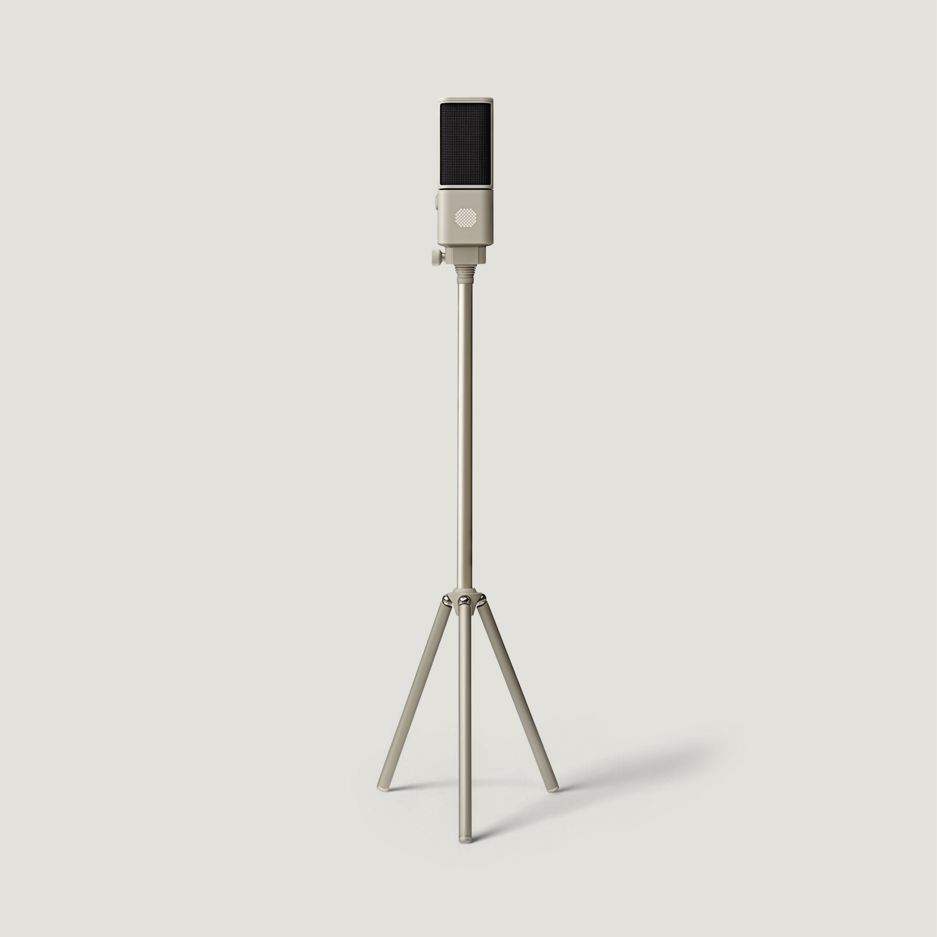 Cream SOVA R1 microphone on a tall floor tripod