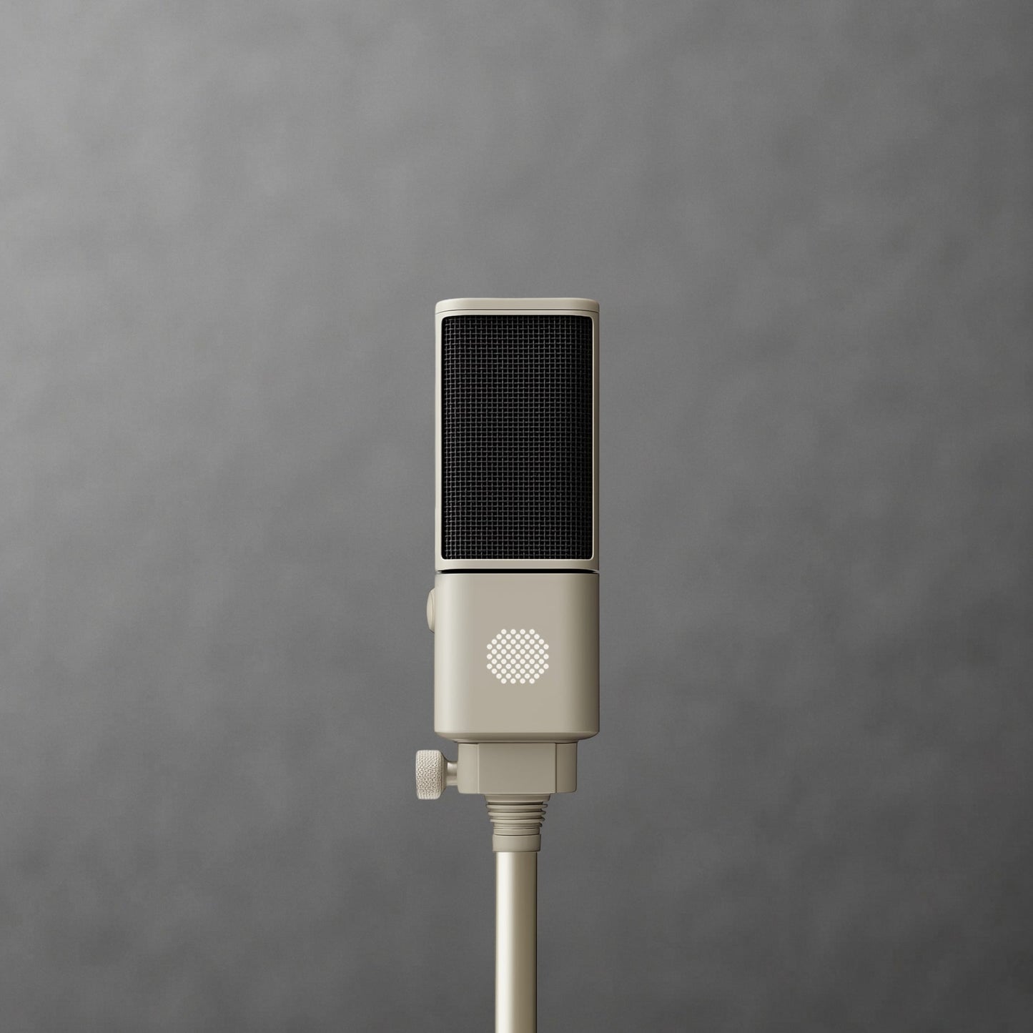 Close-up of a cream SOVA R1 microphone on a stand against gray