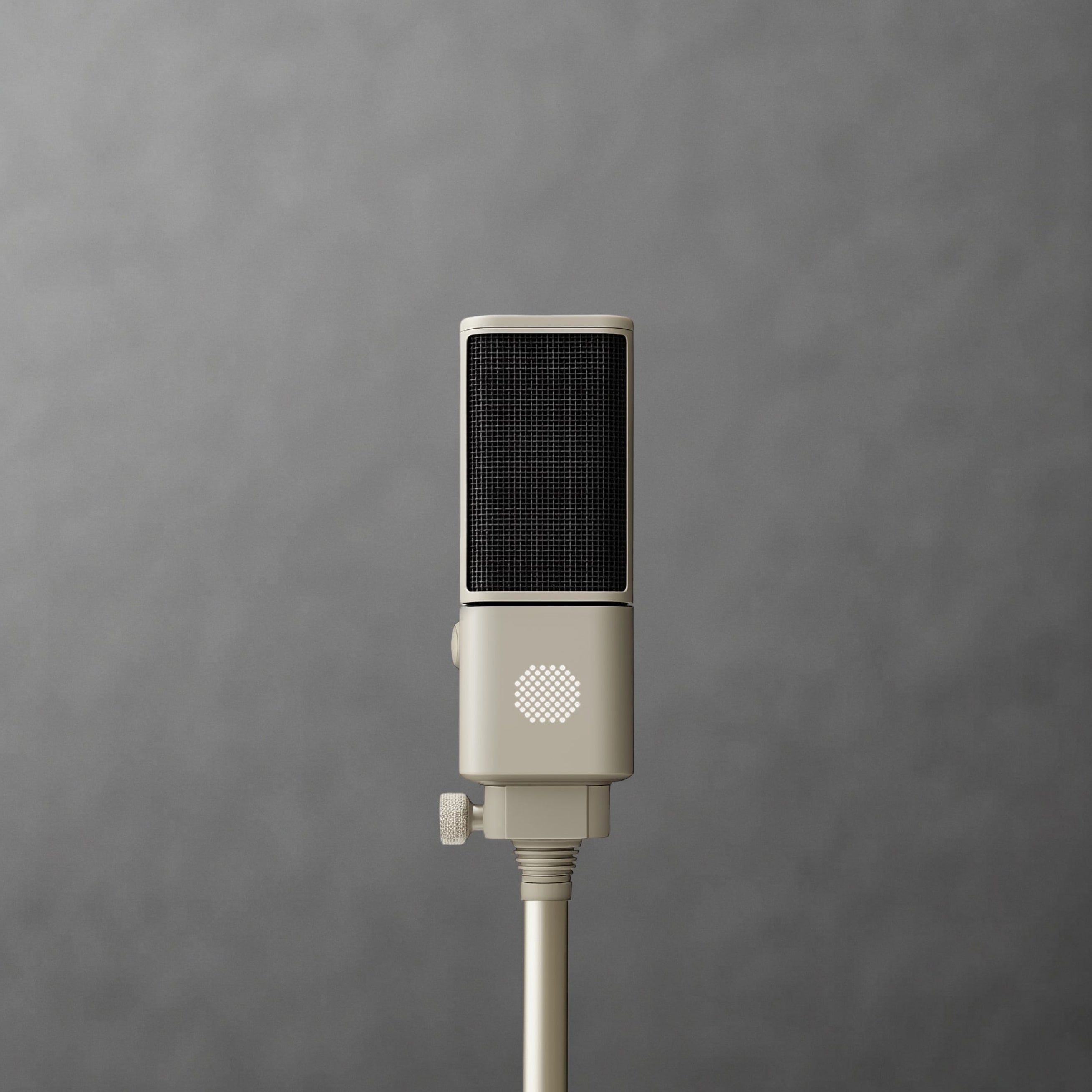 Close-up of a cream SOVA R1 microphone on a stand against gray