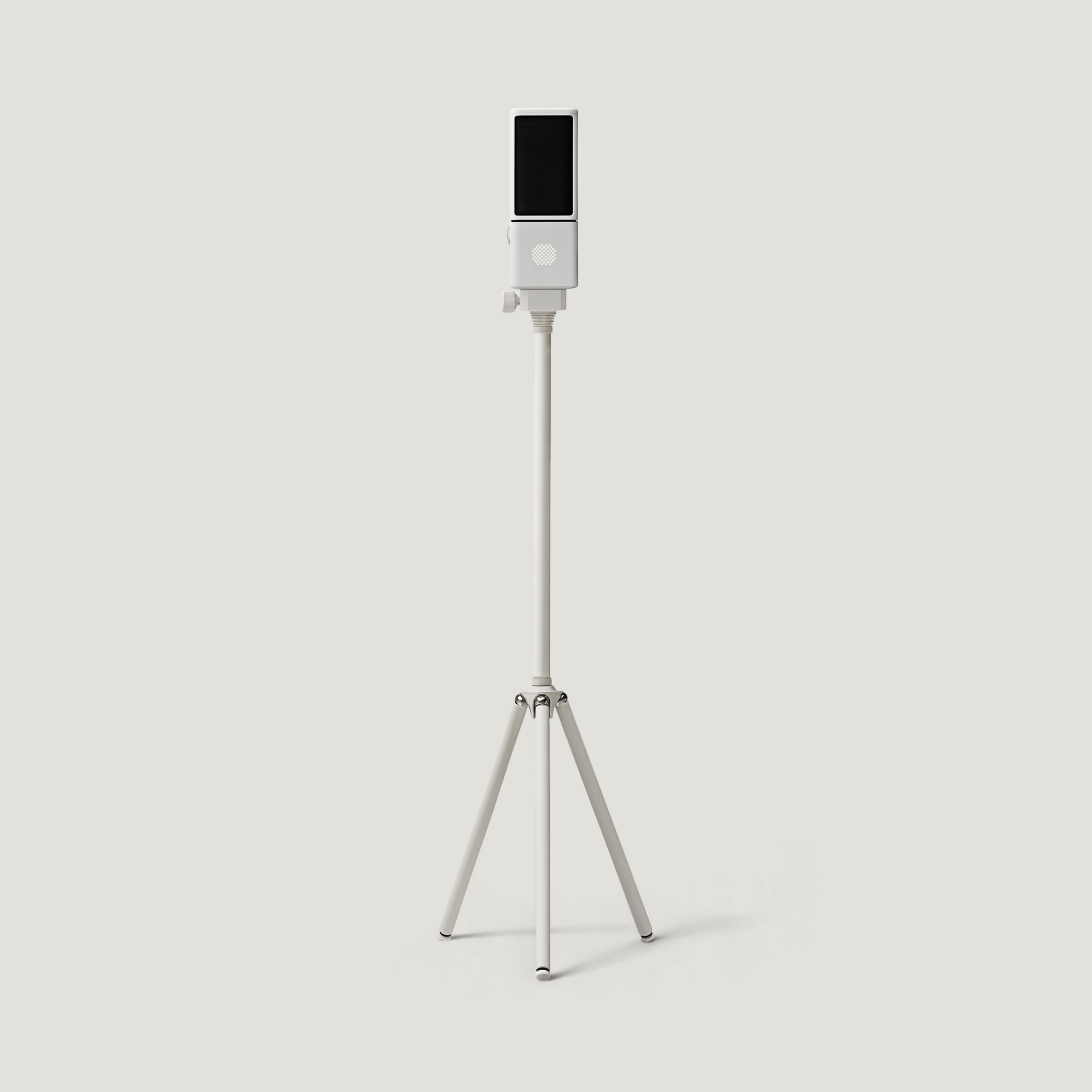 Silver SOVA R1 microphone on a tall floor tripod