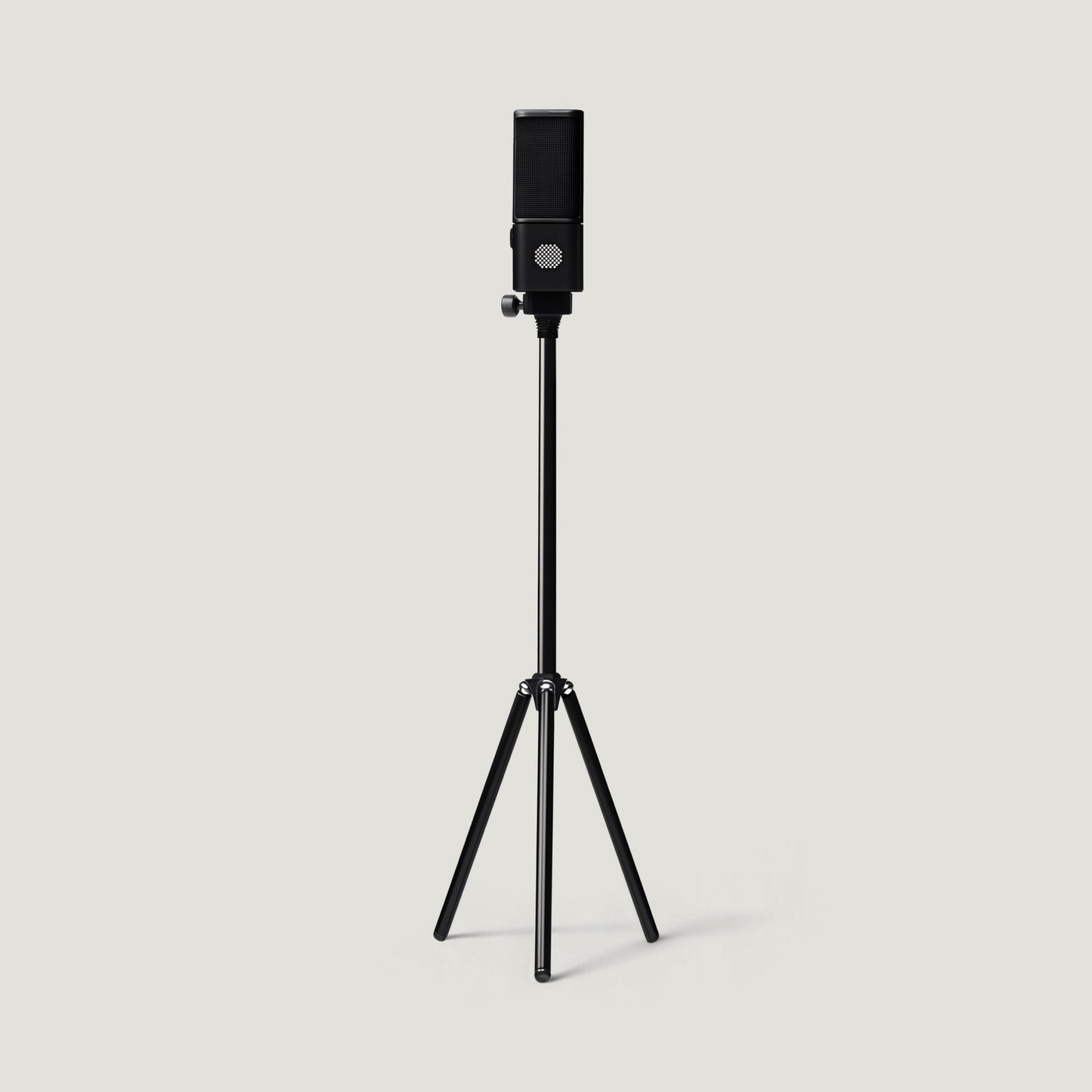 Black SOVA R1 microphone on a tall floor tripod
