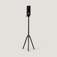 Black SOVA R1 microphone on a tall floor tripod